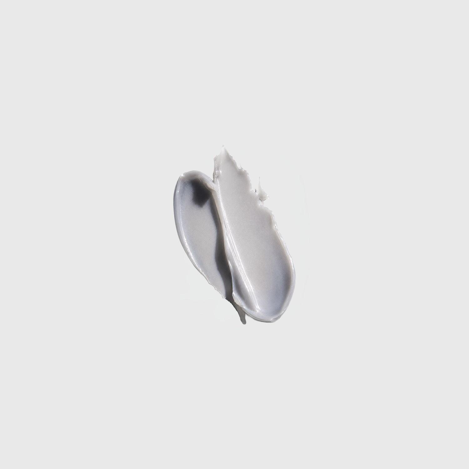 Lavender-gray cream texture with a smooth pearlescent finish on a light gray background
